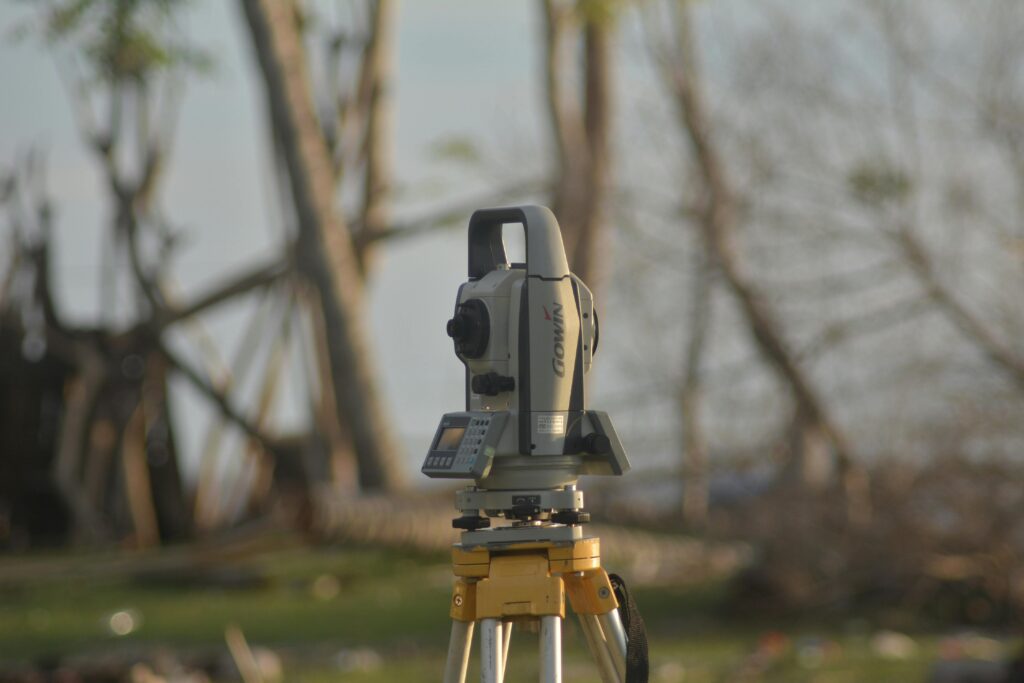 pexels photo 36930873 36930873 A precise total station used for geodetic surveying at a construction site with a natural background.